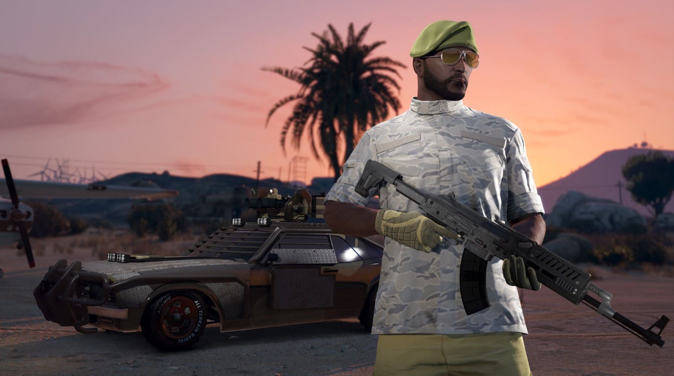 ゲームGTA 5のスクリーンショットは、装甲ストリートレーシングカーの前に立っている武装した男を示す