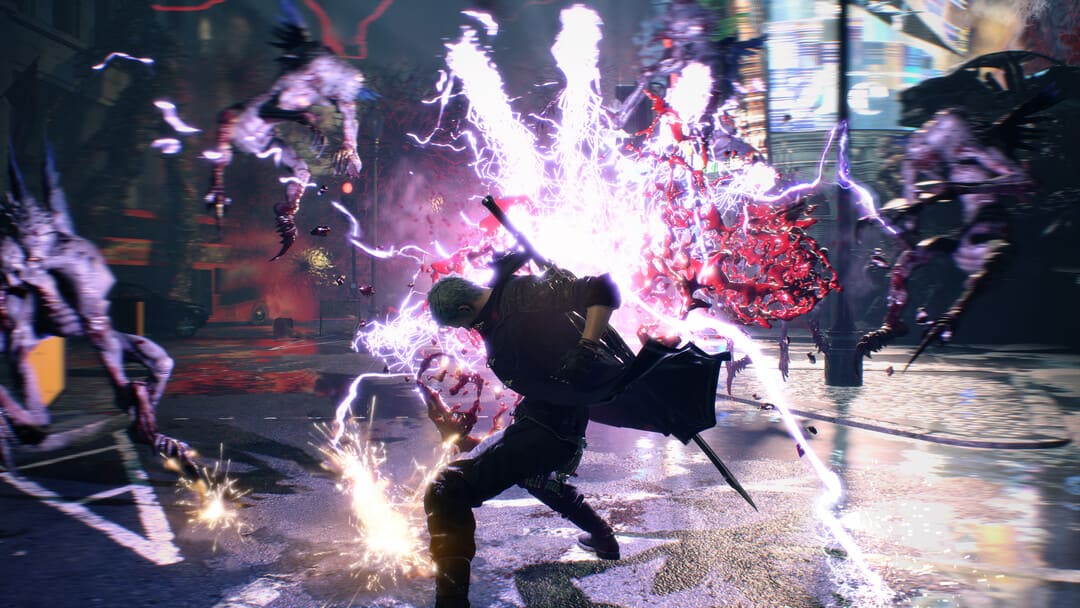 ゲームデビルメイク5のスクリーンショットは、光と血のスプラッターの中で敵を追い払う主人公を示すメインヒーローを示しています