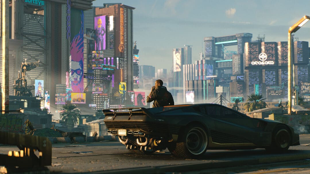 ゲームのスクリーンショットCyber​​Punk 2077は、灰色の未来的なスポーツカーの外で喫煙している男性を示しています。